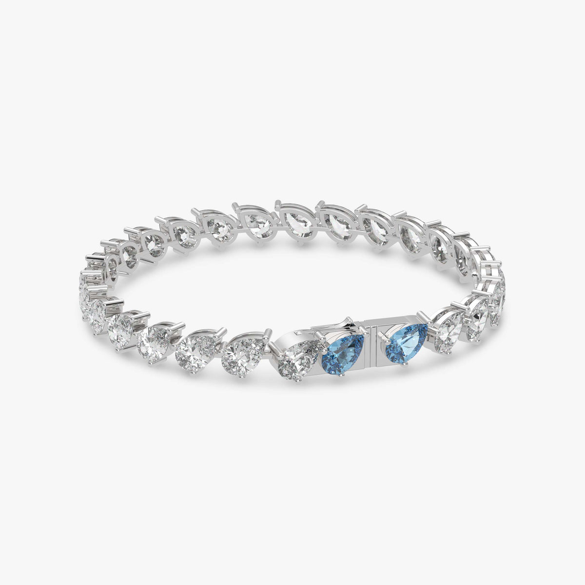 Bracelet tennis coupe poire en diamants bleus