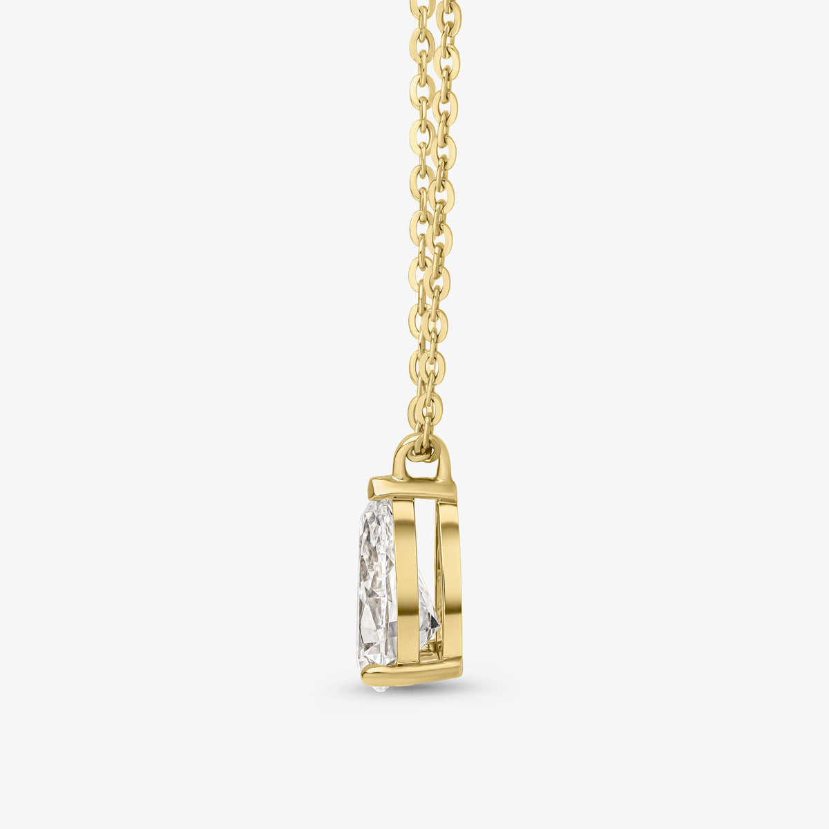 Pendentif en or jaune avec poire et griffes