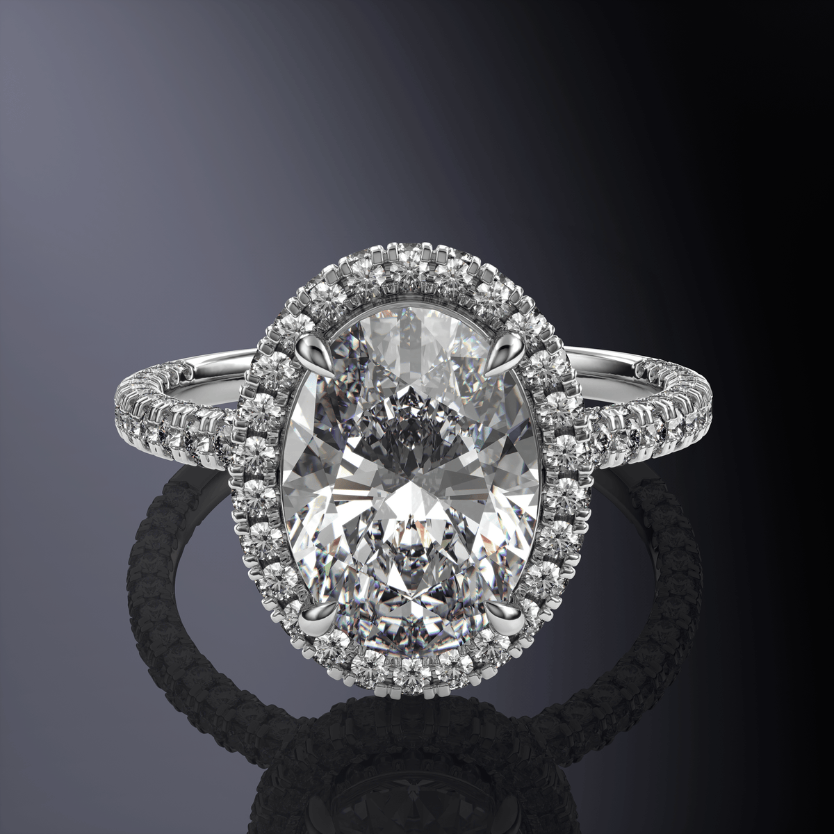 Bague Ovale en Or Blanc avec Halo Caché et Pavage sur Trois Côtés