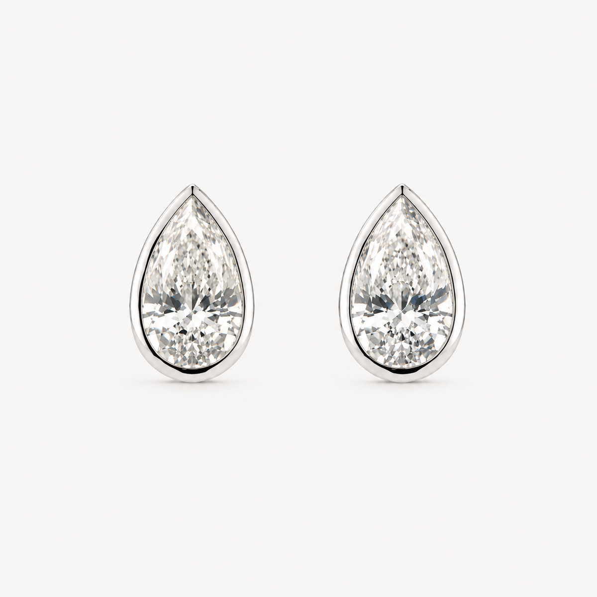 Pear Cut Bezel Studs 18k White Gold