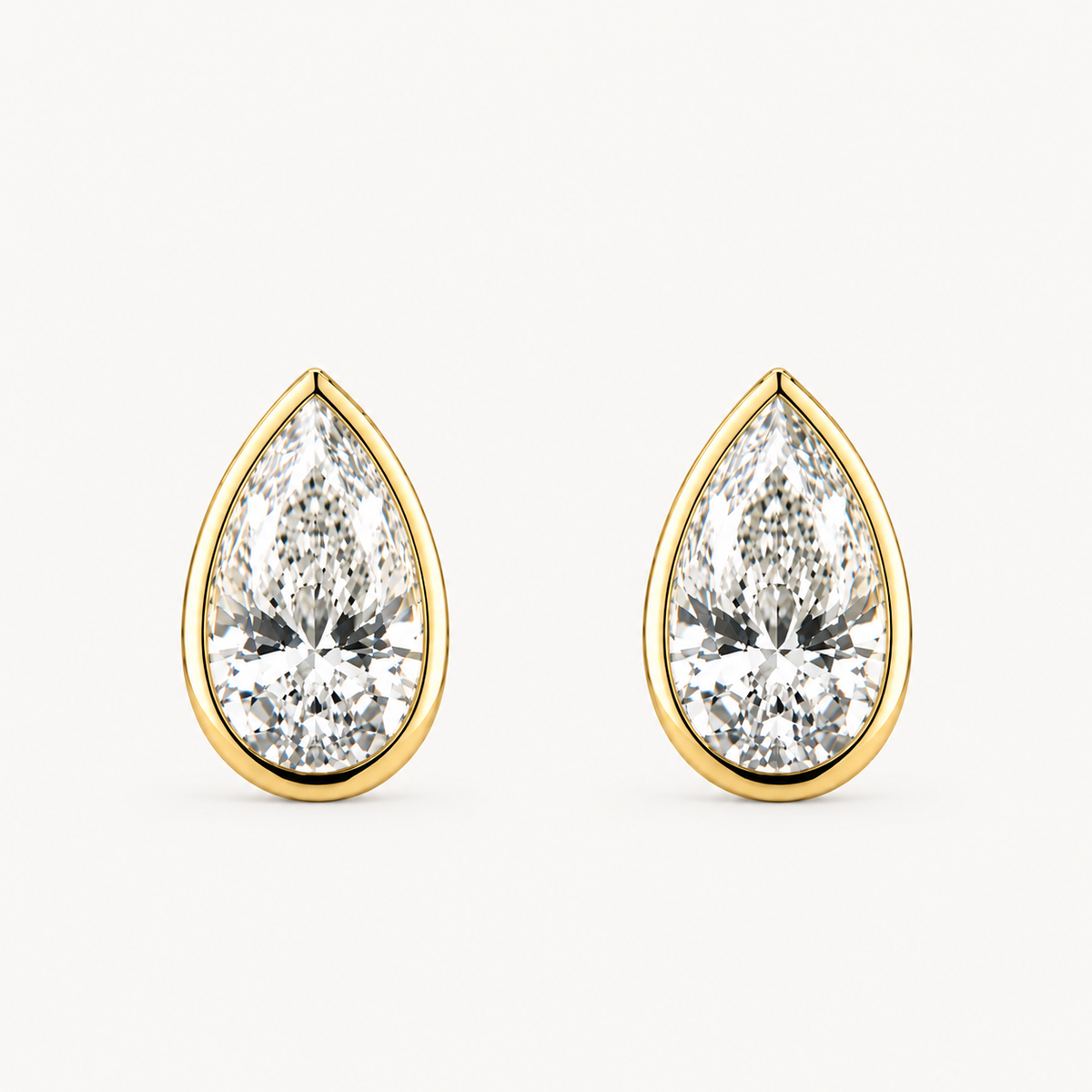 Pear Cut Bezel Studs 18k Yellow Gold
