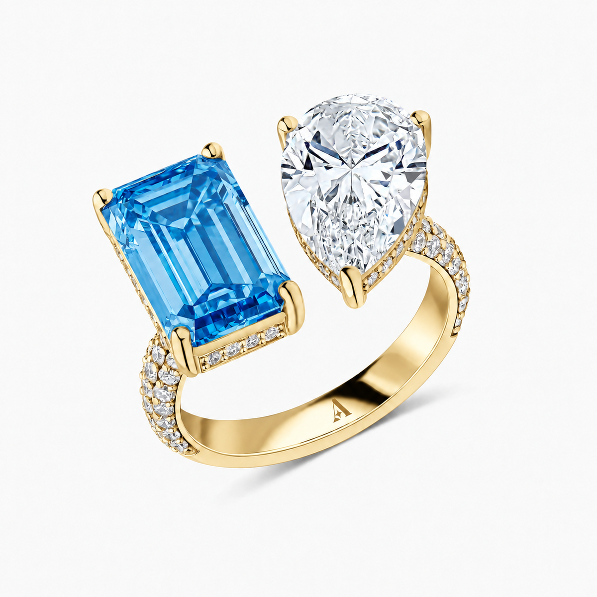 Pear and Emerald Cut Blue Diamond Ring  18k Yellow Gold