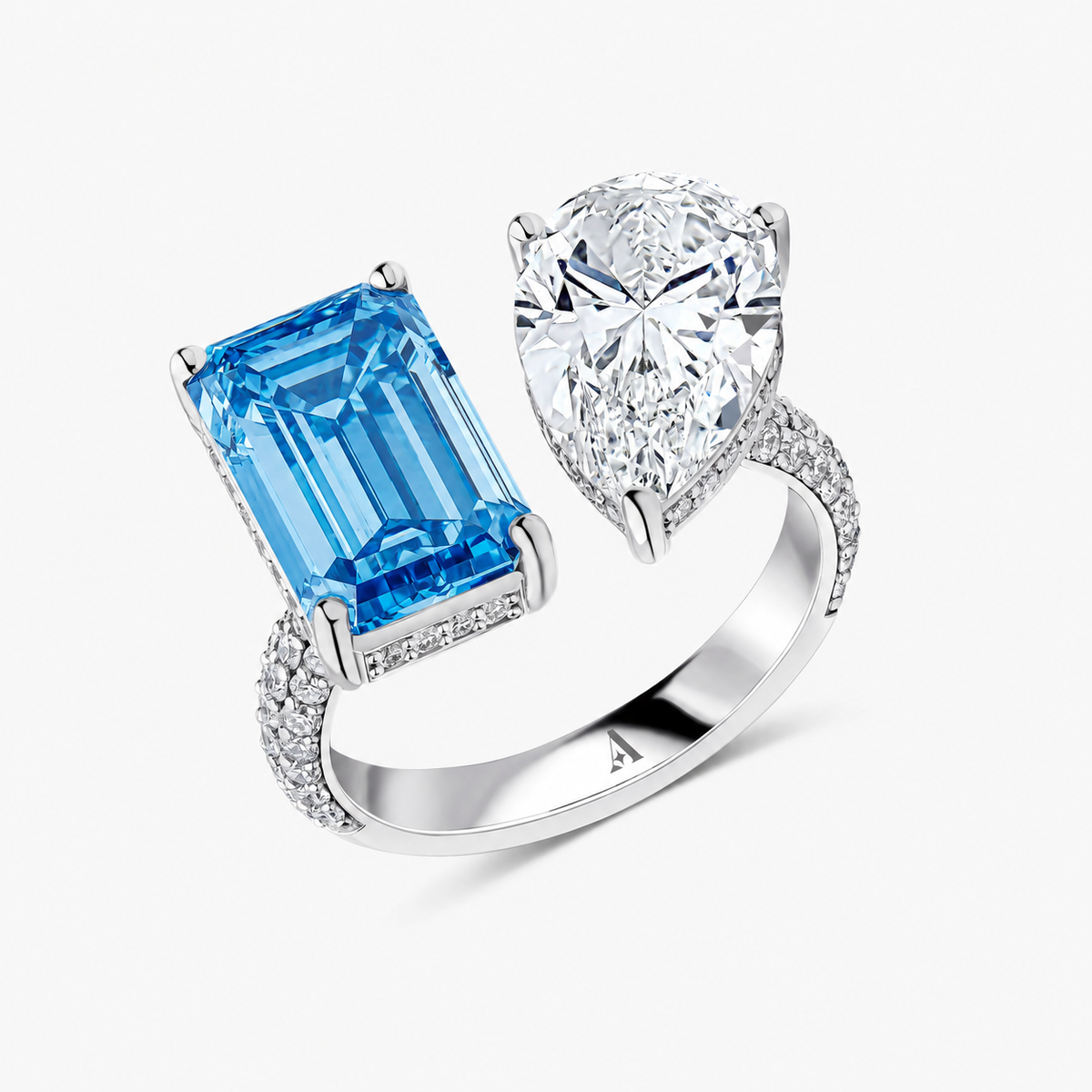 Pear and Emerald Cut Blue Diamond Ring 56