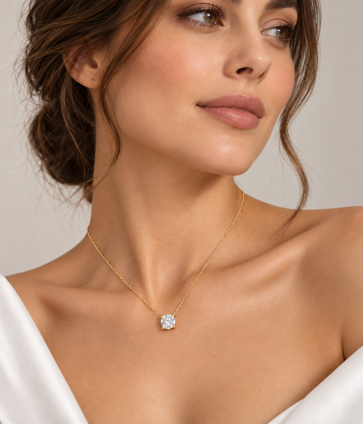 Round Brilliant Cut Prong Set Pendant 18k yellow gold worn by lady