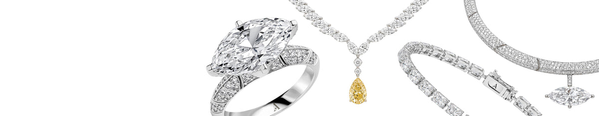 Astrea London lab-grown diamond jewellery arranged in an ivory studio setting